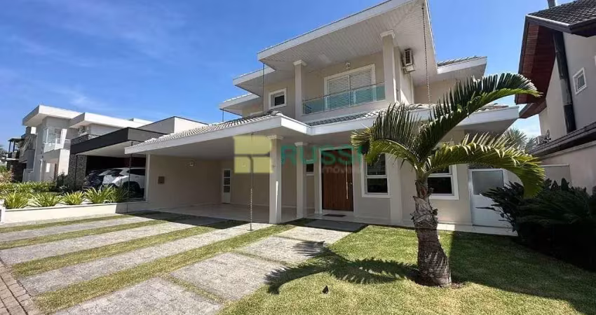 Sobrado com 4 dormitórios à venda, 337 m² por r$ 2.980.000,00 - condomínio residencial jaguary - sã