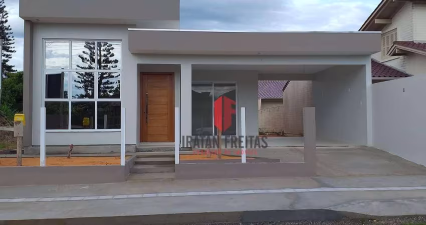 Casa com 3 dormitórios à venda, 132 m² por R$ 675.000,00 - Paraíso - Torres/RS