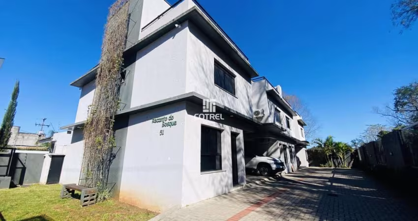 Casa semimobiliada em condomínio fechado com 2 dormitórios e 2 vagas no Bairro T