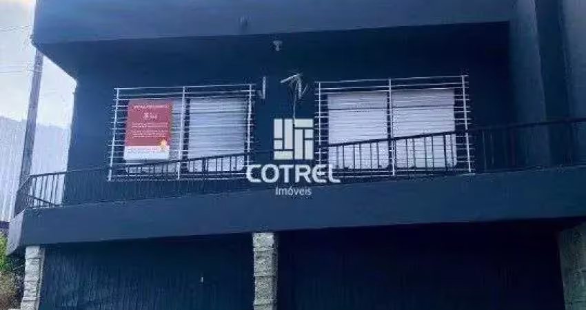Casa comercial para locação 5 salas, 2 vagas de garagem situada no bairro centro