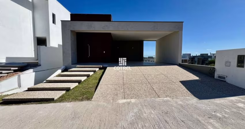 Casa para venda, 3 suítes, 2 vagas de garagem, situada no condomínio fechado Rea
