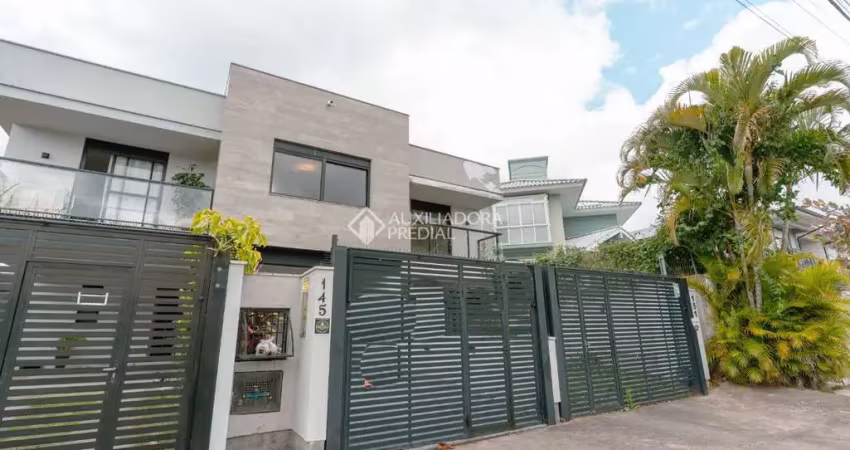 Casa em condomínio fechado com 3 quartos para alugar na Avenida Tucumã, 145, Campeche, Florianópolis