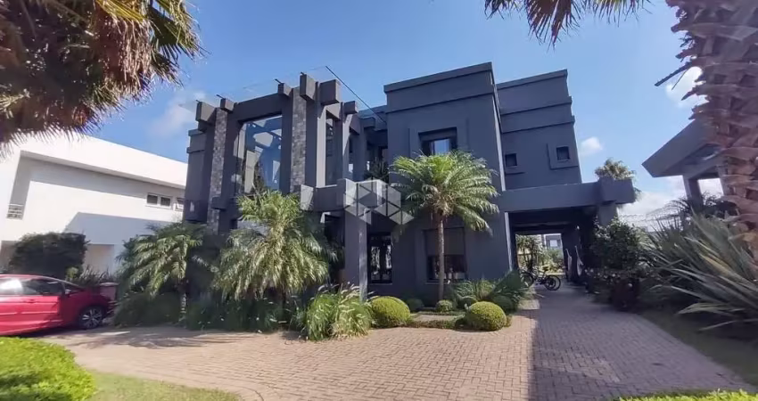 Sobrado à venda, com 5 quartos/dormitórios, 4 vagas/box, no condomínio Villagio, Xangri-Lá/RS
