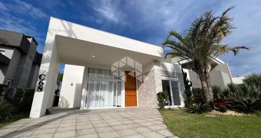Casa à venda, com 4 quartos/dormitórios, e 2 vagas/box no condomínio Enseada, Xangri-Lá/RS