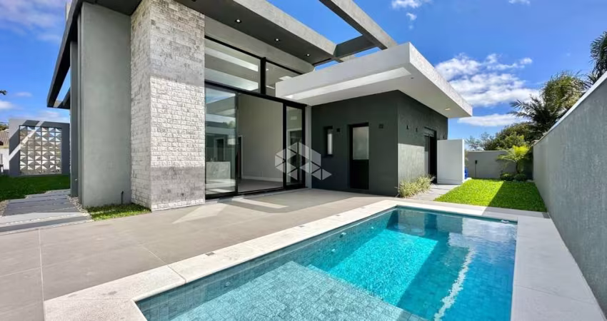 Casa à venda com 4 quartos/suítes e 2 vagas/box em Atlântida, Xangri-Lá/RS