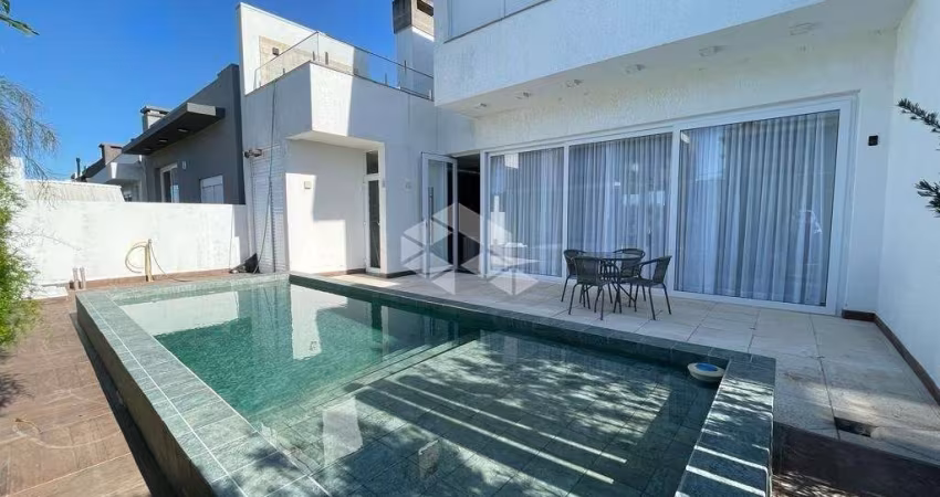 Casa em Condomínio à venda no Blue, Xangri-Lá, com 4 suítes, 277m² e alto padrão de acabamento