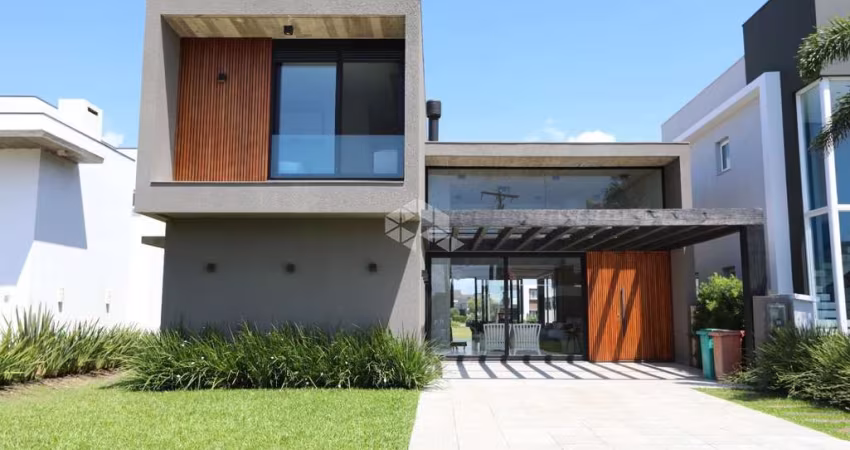 Casa em Condomínio em XANGRI-LÁ com 4 suítes - RIVIERA
