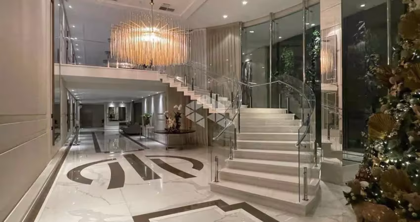 Apartamento com 4 quartos , 4 suítes e 6 vagas de garagem .
