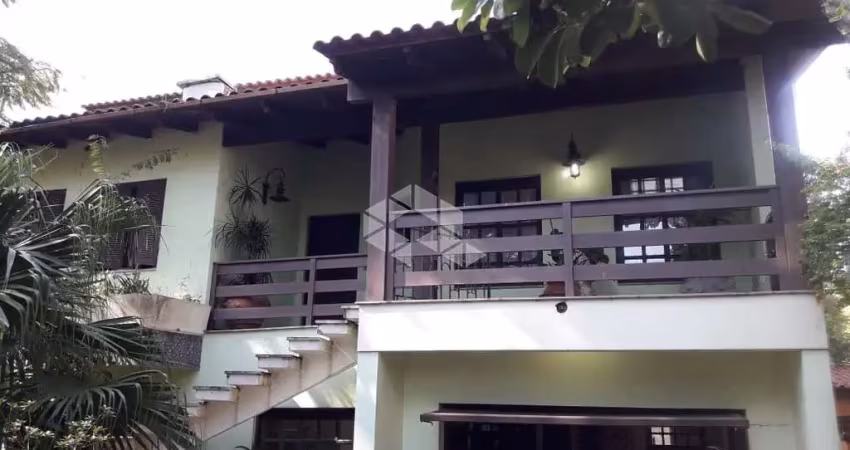 Casa com 5 quartos à venda na Rua Santa Maria, 370, Vila São José, Porto Alegre