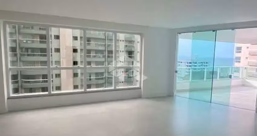 Apartamento com três quartos na meia praia itapema sc