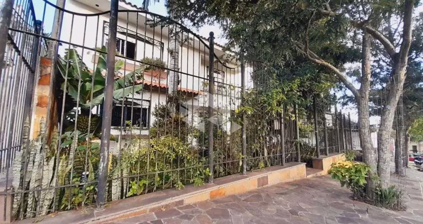Casa no bairro itararé com 4 dormitórios, suíte e vaga de garagem em santa maria.