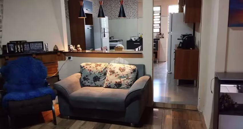 Casa com 3 dormitório, 2 banheiros, piscina aquecida e placa solar à venda em santana do livramento