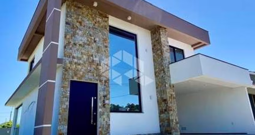 Casa em Condomínio Fechado à venda em Camobi  com 3 suítes