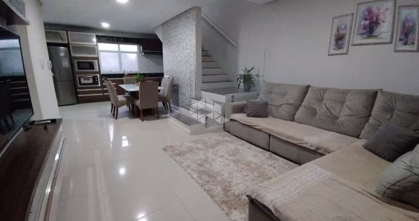 Casa à venda com 3 quartos e suíte no bairro Parque Pinheiro Machado em Santa Maria RS