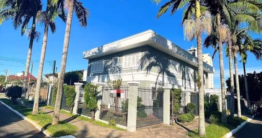 ÓTIMA CASA TIPO SOBRADO 5 DORMITÓRIOS, 3 SUÍTES, PISCINA, 5 VAGAS NO MAL RONDON EM CANOAS.