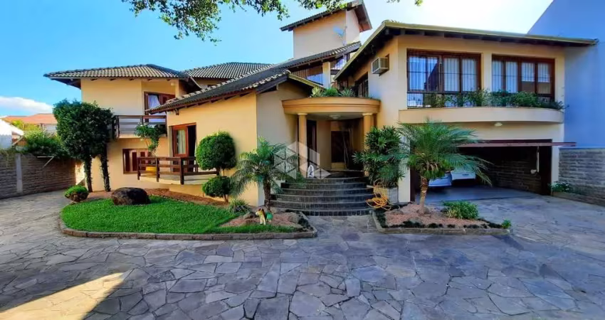 Casa com 6 quartos à venda na Rua das Hortênsias, 129, Igara, Canoas