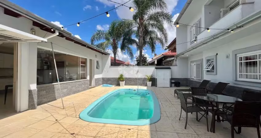 Sobrado de 4 dormitórios, 1 no térreo, piscina, 4 vagas, no bairro bela vista em canoas!