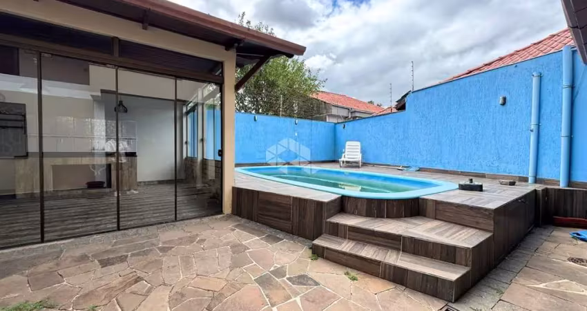 Casa com 3 dormitórios, 1 suíte master, piscina, área gourmet, no bairro estância velha, na cidade de canoas. aceita financiamento bancário e fgts.
