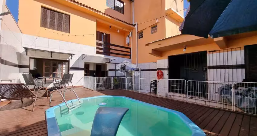 Casa 6 dormitórios, 1 suíte com hidromassagem, salão de festas com churrasqueira, estância velha/canoas. próximo parkshopping. aceita imóvel