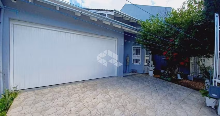 Casa térrea com 2 dormitórios sendo uma suíte no bairro Moinhos de Vento/Canoas.