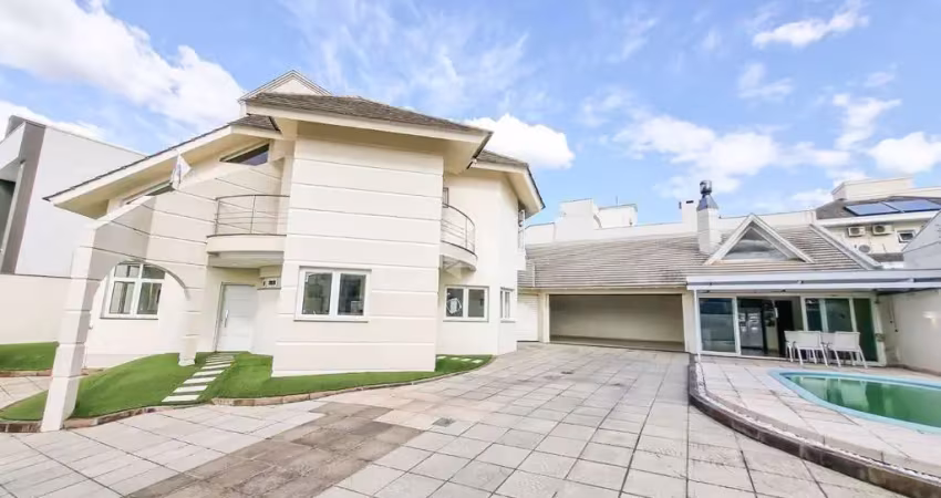 Casa 4 dormitórios, 3 suítes, piscina, garagem ampla, moinhos de vento - canoas, mobiliada com eletros completa, aceita financiamento