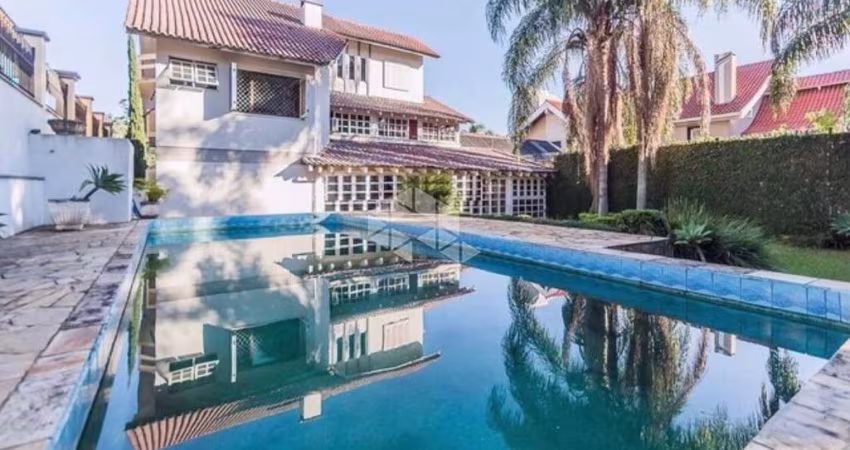 casa sobrado com 6 dormitórios, sendo 5 suítes, 4 vagas