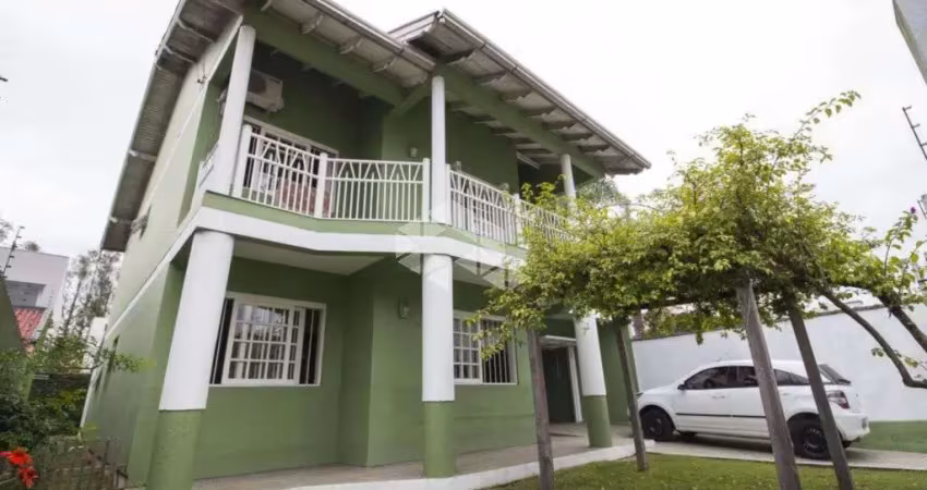 Casa à venda em canoas com 3 dormitórios, financiamento e espaço gourmet próximo ao parkshopping