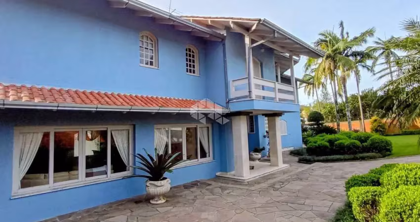 Casa sobrado 6 dormitórios 2 suítes, sendo uma com 80m², 8 vagas cobertas, ar central, piscina, salão de festas, amplo jardim, nossa senhora/canoas