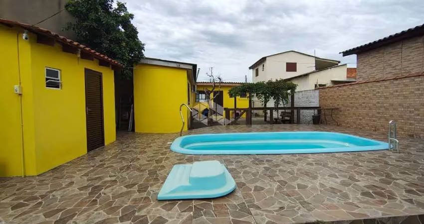 Casa  2 dormitórios piscina vaga 5 carros harmonia canoas