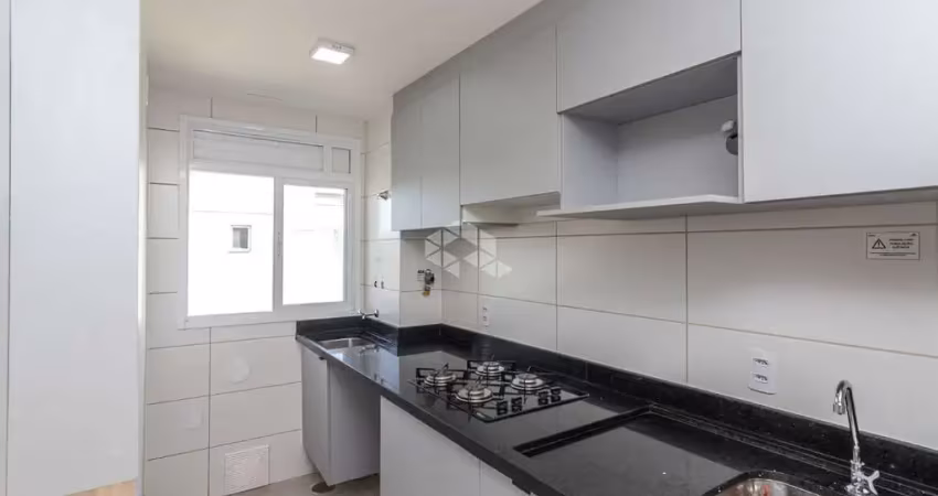 Apartamento de 2 dormitórios, sala de estar e jantar integrado a cozinha planejada e banheiro. no bairro estancia velha/ canoas.