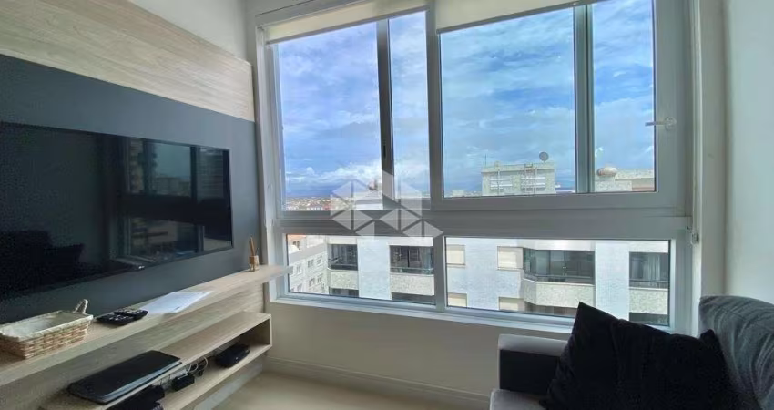 Apartamento com 2 dormitórios, sendo 1 suíte, de frente, churrasqueira box, Centro