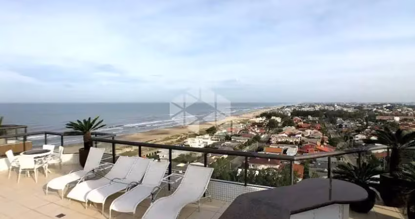 Cobertura 4 dormitórios de frente para o mar em capão da canoa!