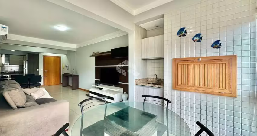 Apartamento à venda no navegantes, capão da canoa com 2 quartos (1 suíte) - ampla sacada leste, mobiliado e com negociação facilitada