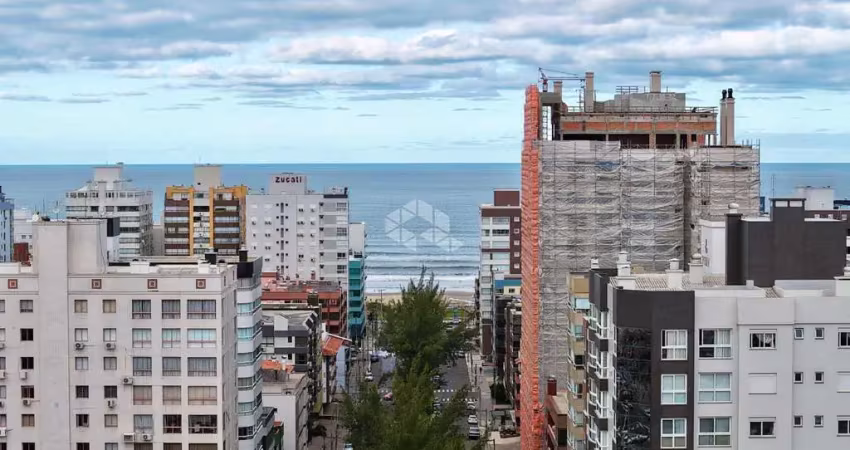 Dois dormitórios no centro de capão com vista mar mobiliado