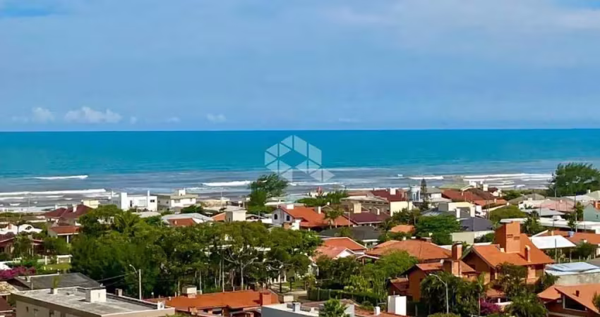 Apartamento com  03 suítes, lavabo, sacada de frente integrada, vista definida para o mar, infraestrutura, capão da canoa