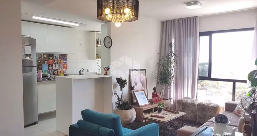 Apartamento 3 dormitórios, sacada e churrasqueira.