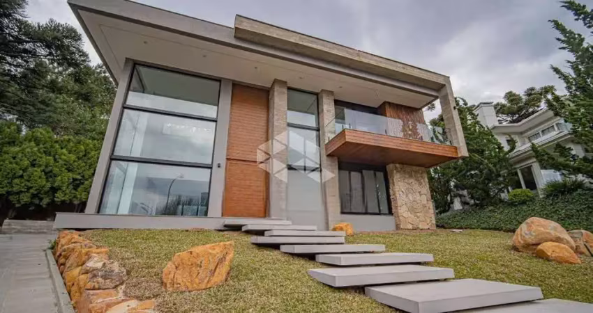 Casa de alto padrão no alphaville gramado - 4 suítes e vista exclusiva