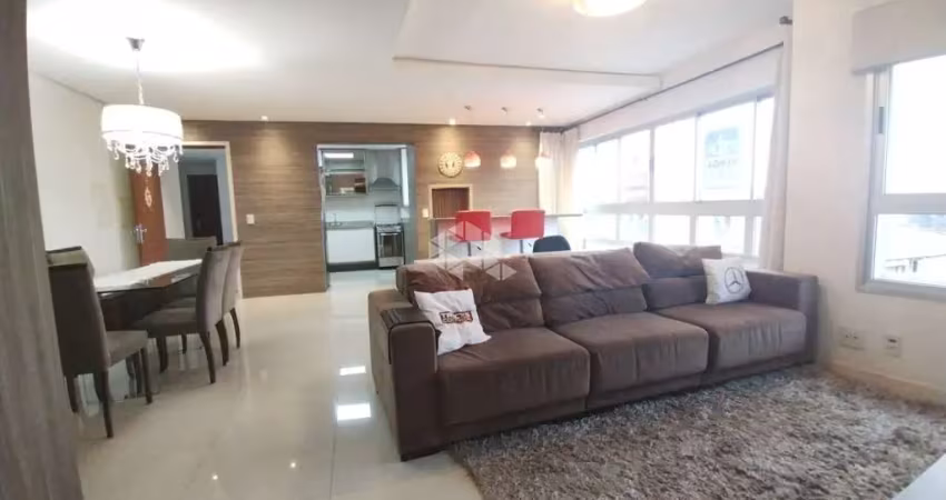 Magnífico apartamento de três dormitórios com suíte e duas vagas de garagem