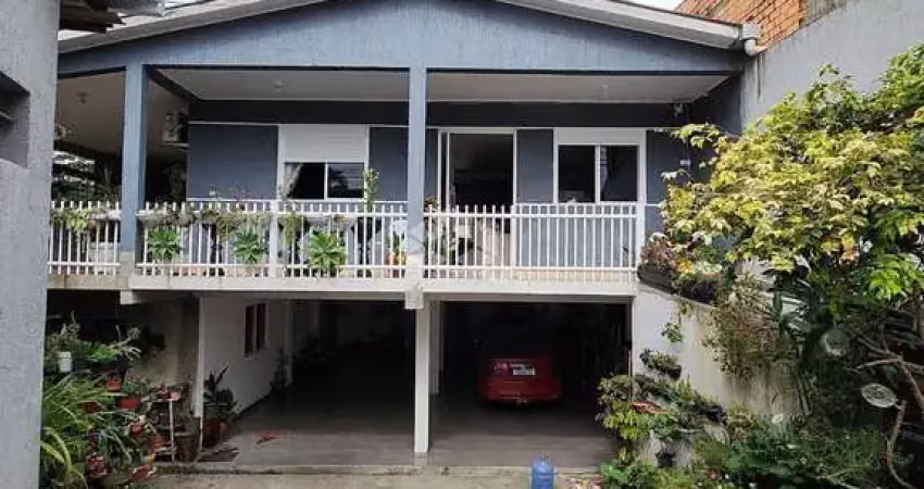 Casa com 5 quartos à venda na Rua Dormênio, 10, Santa Tereza, Porto Alegre