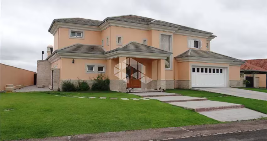 Casa em condomínio com 4 quartos, sendo 4 suítes, 506m², 4 vagas no bairro terra ville porto alegre