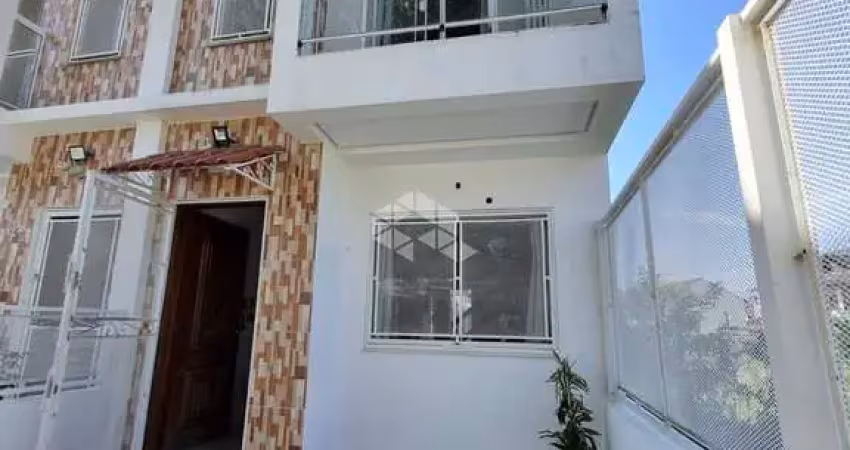 Casa com 2 quartos à venda na Rua Luzinete Alves Aragon, 145, Hípica, Porto Alegre
