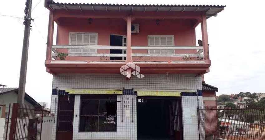 Casa 03 dormitórios com suite,  sendo mista residencia e comercial.