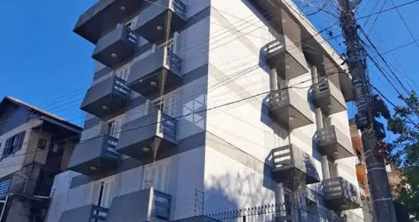Apartamento com três dormitórios (sendo uma suíte) com duas vagas de garagem