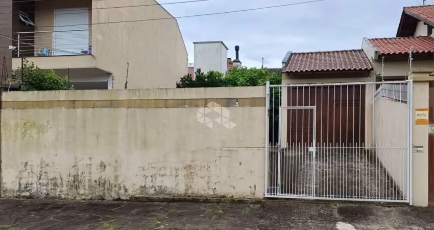 Terreno murado de 200m² no bairro igara, com garagem e portão eletrônico.