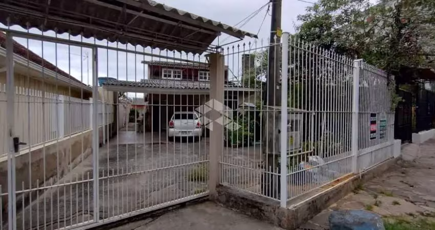 Casa a venda no centro de canoas c/3 quartos. 2 banheiros