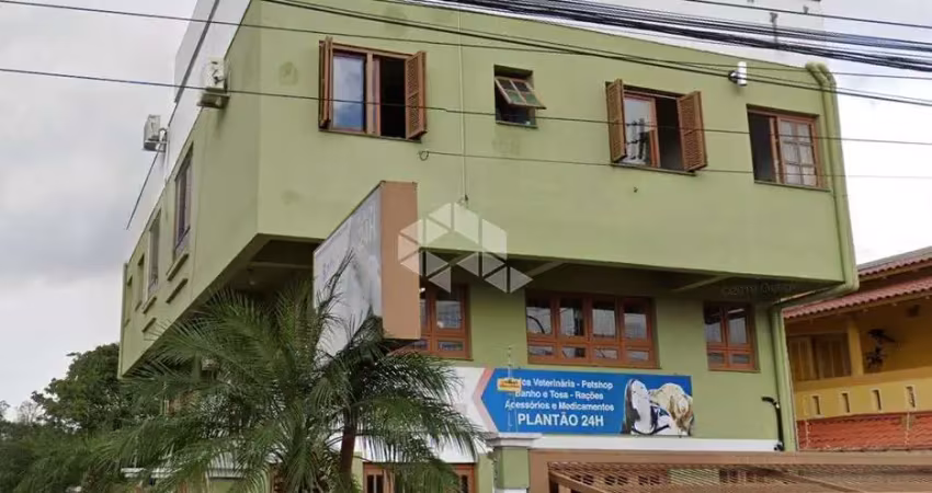 Prédio residencial com 3 apartamentos e 1 sala comercial no bairro moinhos de vento em canoas