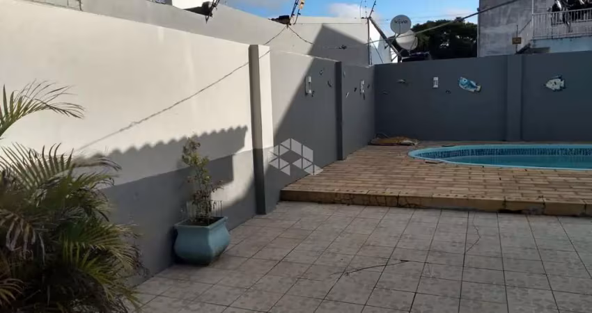 Casa  de 4 quartos, churrasqueira e piscina no bairro harmonia  em canoas rs