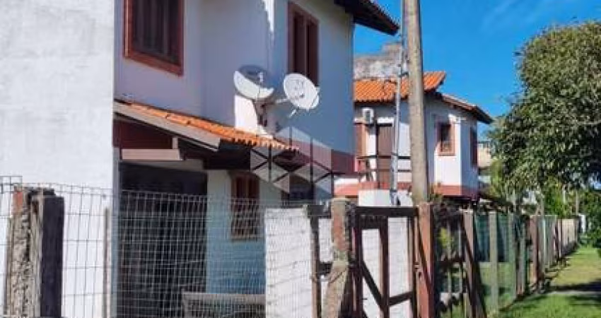 Casa de 2 andares  2 dormitórios dentro de Condomínio Fechado na Praia Imbé.