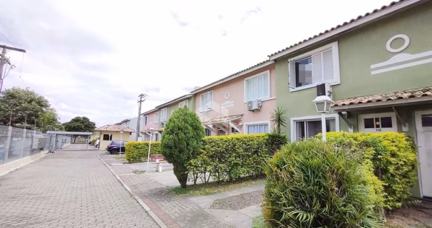 Casa estilo sobrado em condomínio de 02 dormitórios com 72m² privativos no Sarandi