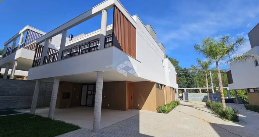 Casa residencial em condomínio fechado no Bairro Cacupé, Florianópolis-SC